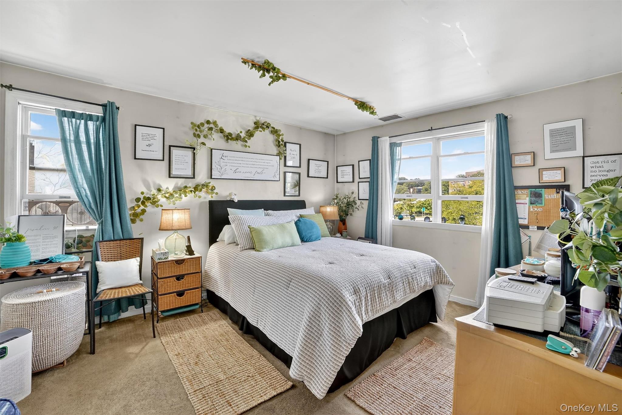 37 Harbor Lane, Unit 2A New Rochelle, NY 10805 - Photo 15 of 23 a bedroom with a bed and large windows