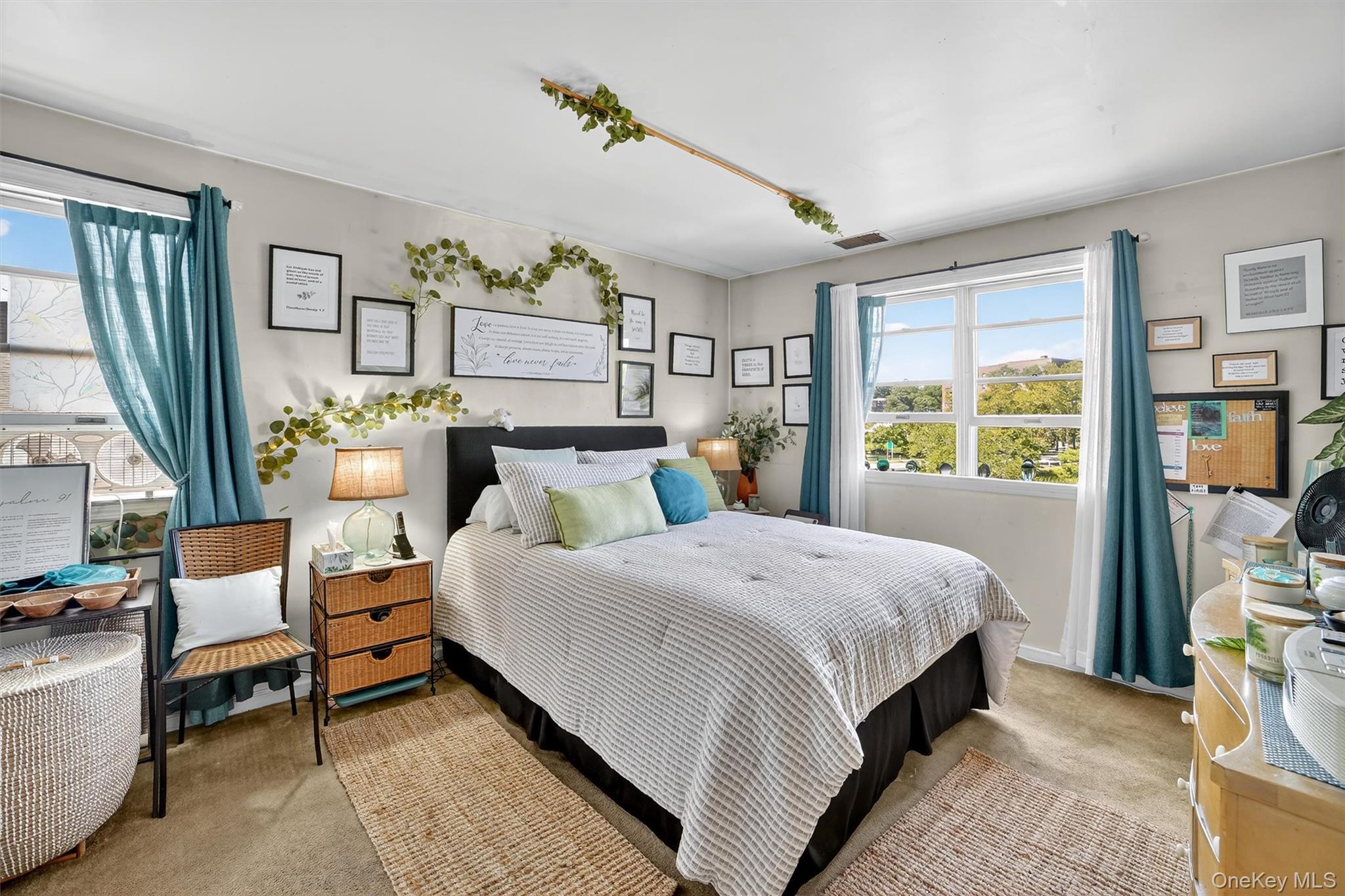 37 Harbor Lane, Unit 2A New Rochelle, NY 10805 - Photo 16 of 23 a bedroom with a bed and wooden floor