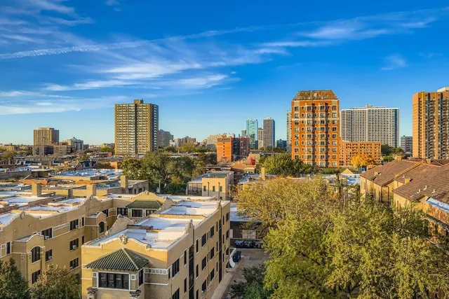 a view of city with tall buildings