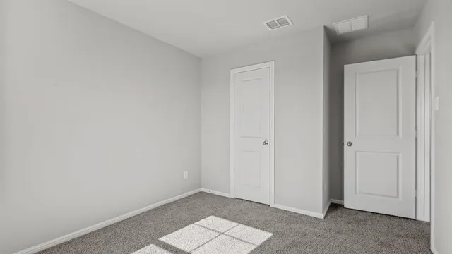 a bathroom with a sink toilet and mirror