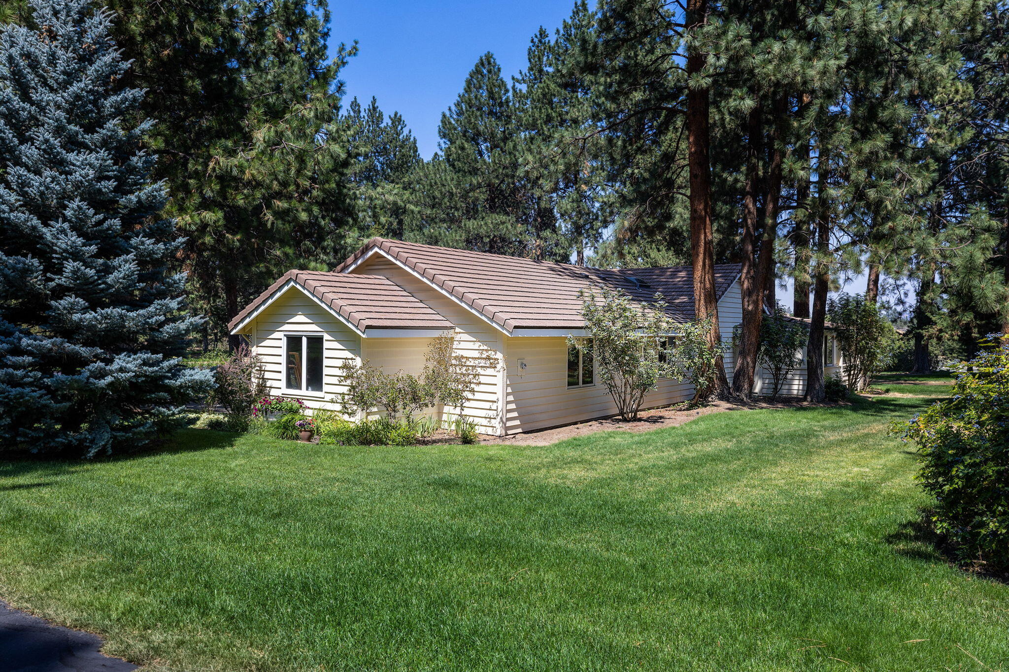 20408 Butt Riggin Road Bend, OR 97702 - Photo 31 of 36 a view of a house with yard