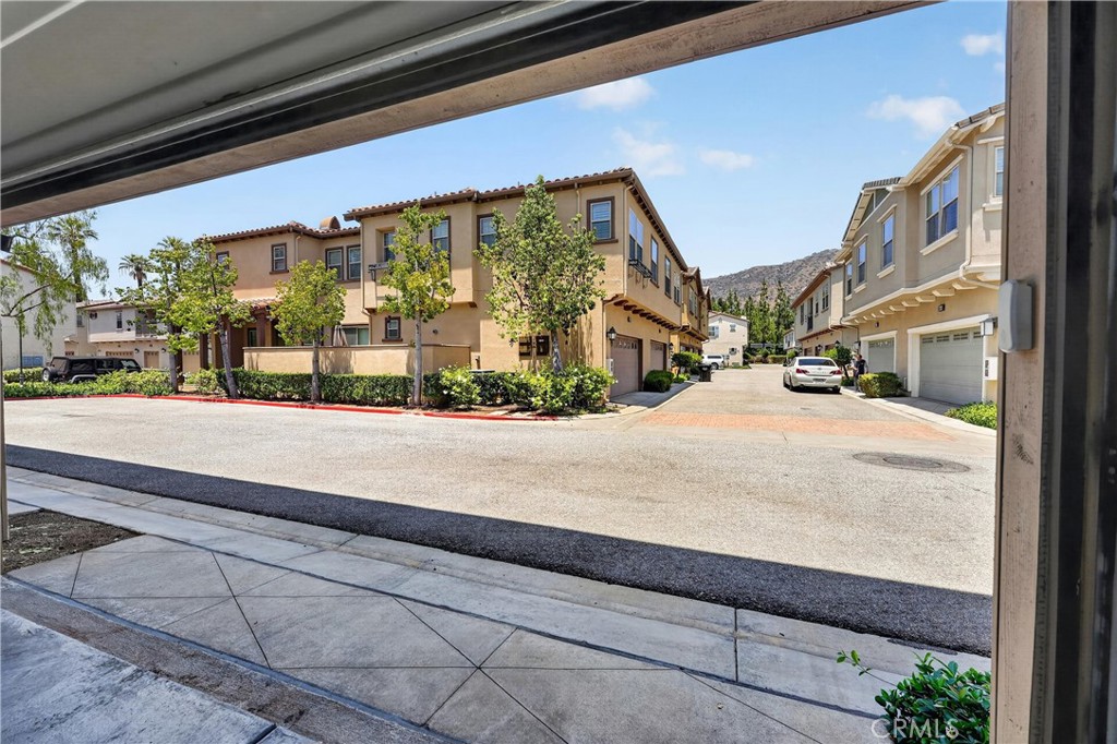 849 The Promenade, Unit D Azusa, CA 91702 - Photo 30 of 37 a view of a building along the street