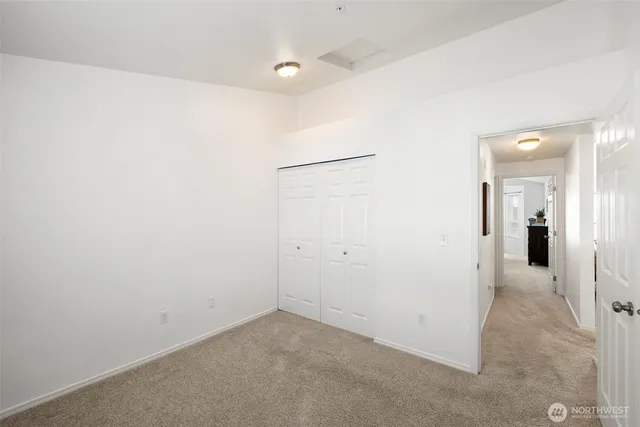 an empty room with a bathroom