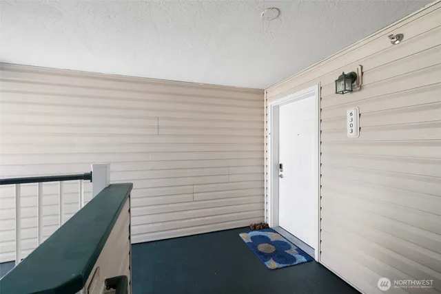 a view of a hallway with closet