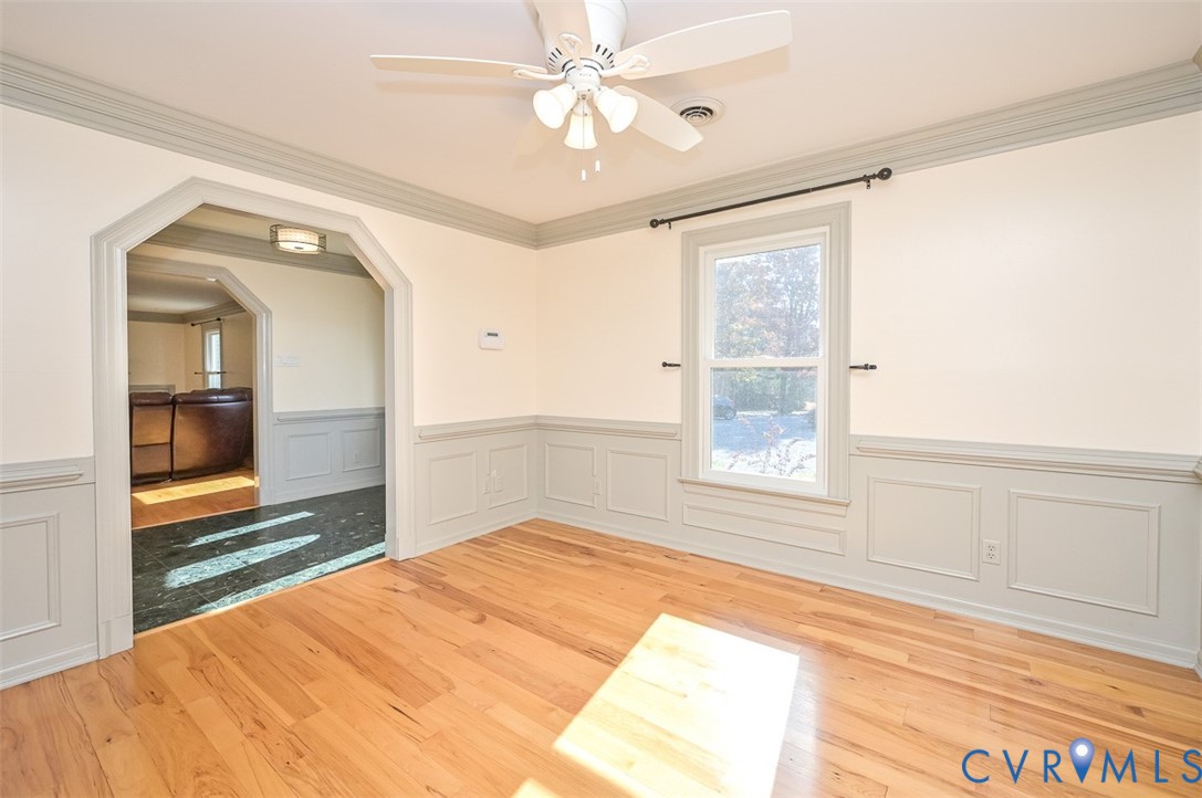 425 Starview Lane Gum Spring, VA 23065 - Photo 12 of 50 a bedroom with a bed and a chandelier fan
