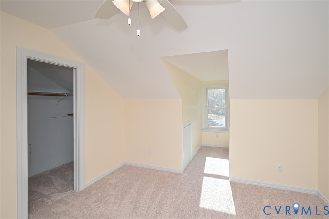 425 Starview Lane Gum Spring, VA 23065 - Photo 29 of 50 an empty room with wooden floor and windows