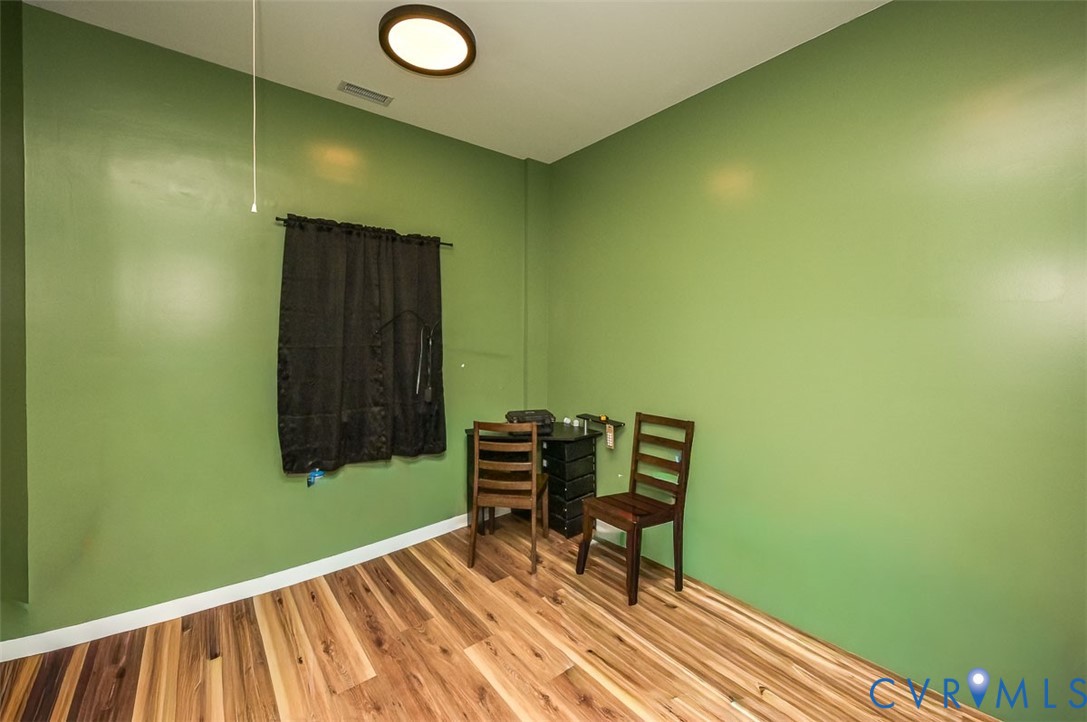 425 Starview Lane Gum Spring, VA 23065 - Photo 47 of 50 a view of a room with wooden floor and furniture