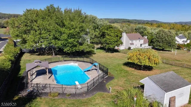 a view of a house with a yard and plants
