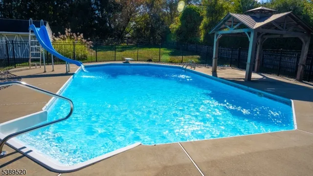 a view of a backyard with a slide