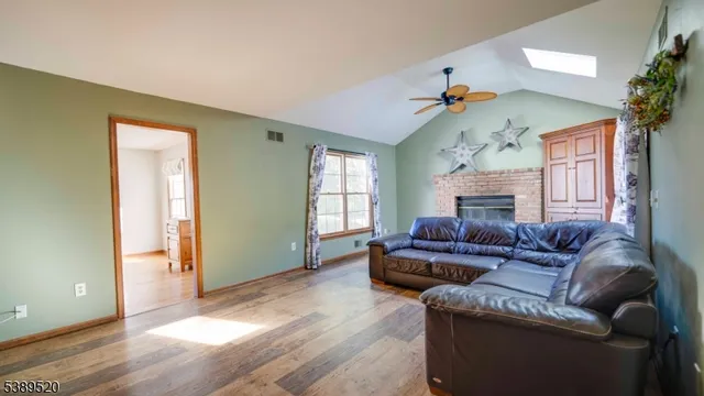 a view of a hallway view with staircase