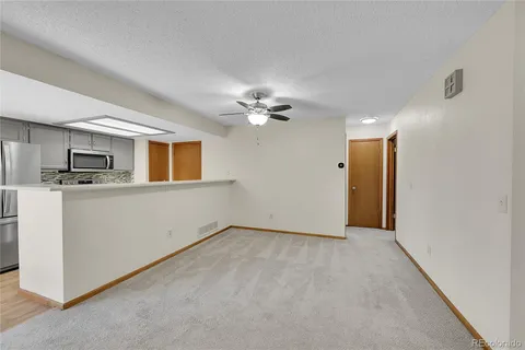 a view of a kitchen with a sink