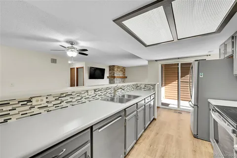 a bathroom with a sink and a large mirror