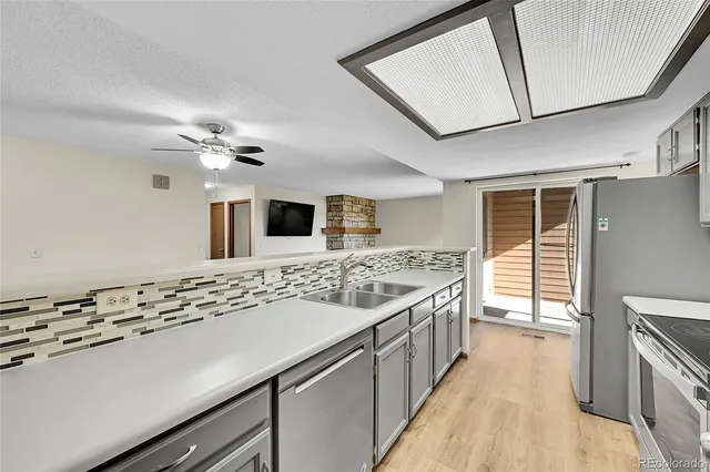 a bathroom with a sink and a large mirror