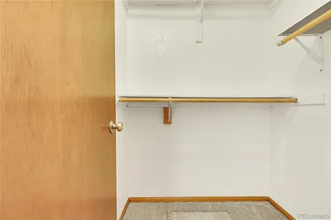 a view of small space with racks on the wall