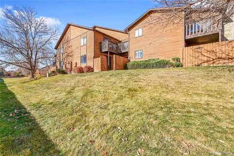 a view of a backyard of the house