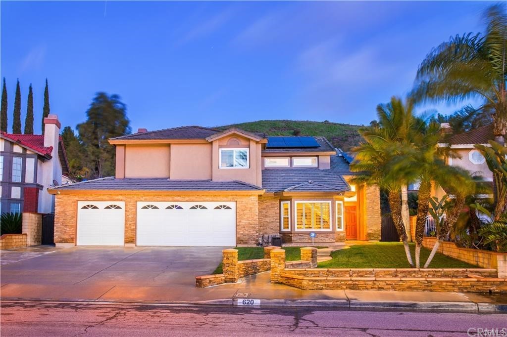 620 Boxcove Place Diamond Bar, CA 91765 - Photo 1 of 1 a view of an house with backyard space and balcony