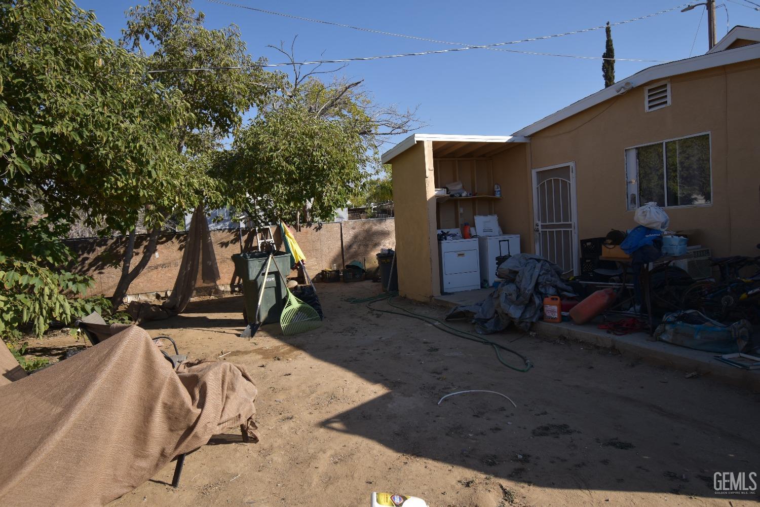 Undisclosed Address Bakersfield, CA 93305 - Photo 12 of 23 a view of house with patio outdoor seating