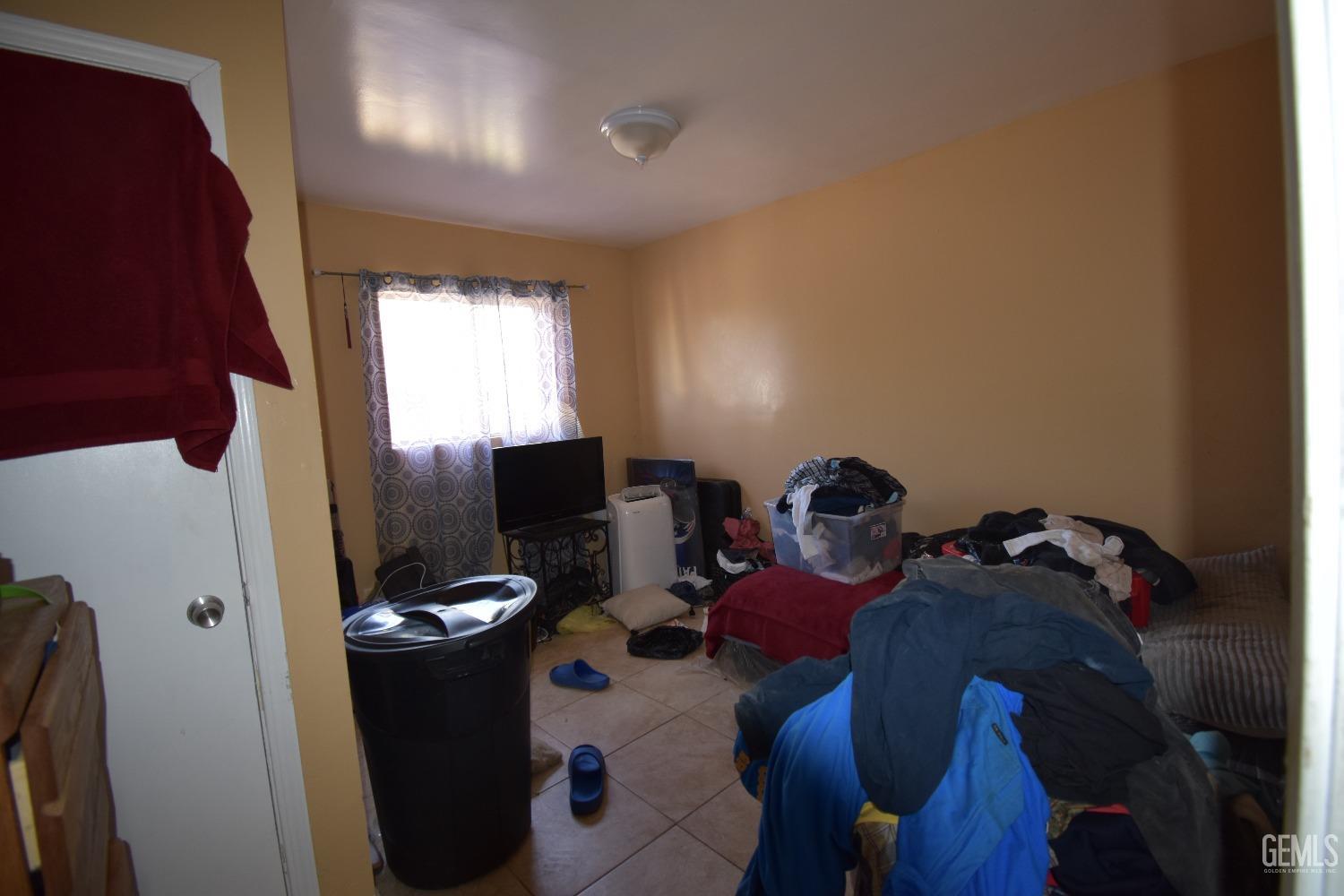 Undisclosed Address Bakersfield, CA 93305 - Photo 17 of 23 a view of workspace with wooden floor and windows