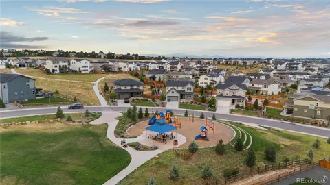 an aerial view of a house with outdoor space