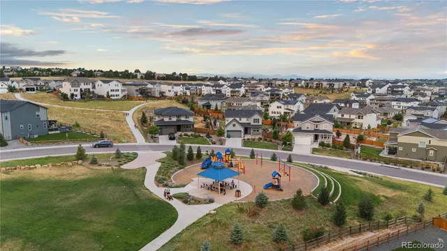 an aerial view of a house with outdoor space
