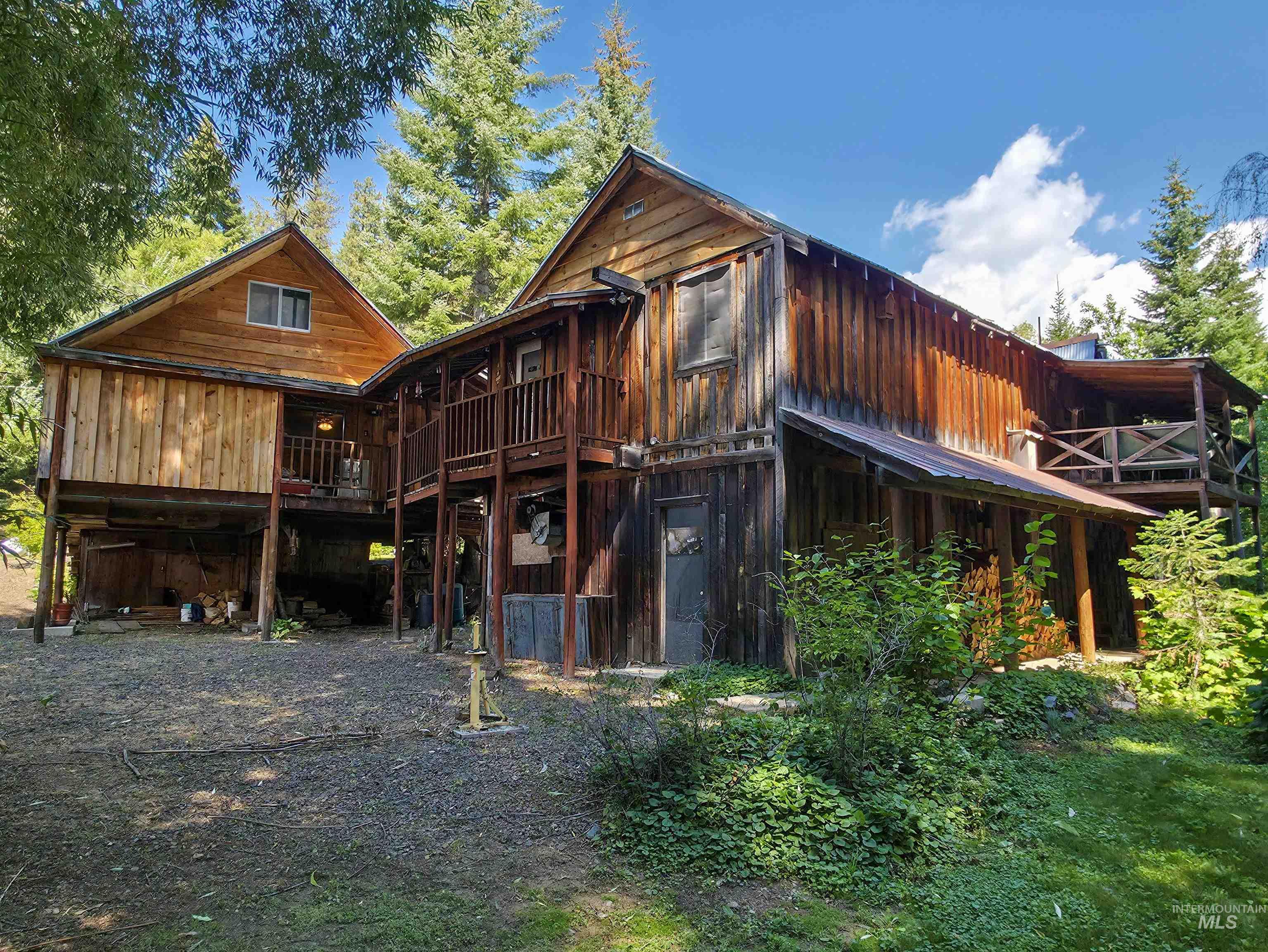 4482 Council Cuprum Road Council, ID 83612 - Photo 1 of 45 Rear view of property with a deck