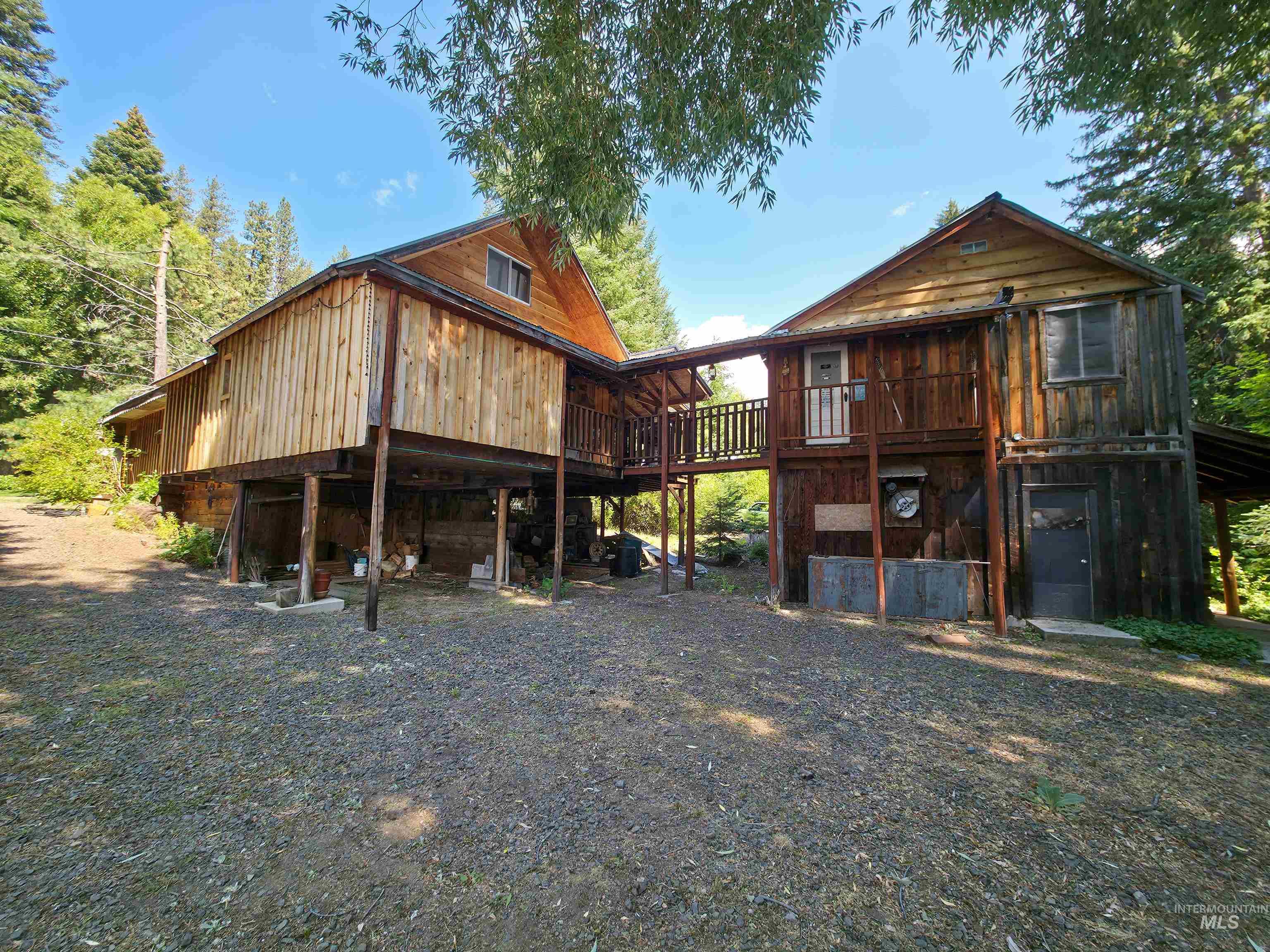 4482 Council Cuprum Road Council, ID 83612 - Photo 34 of 45 Rear view of house featuring a wooden deck