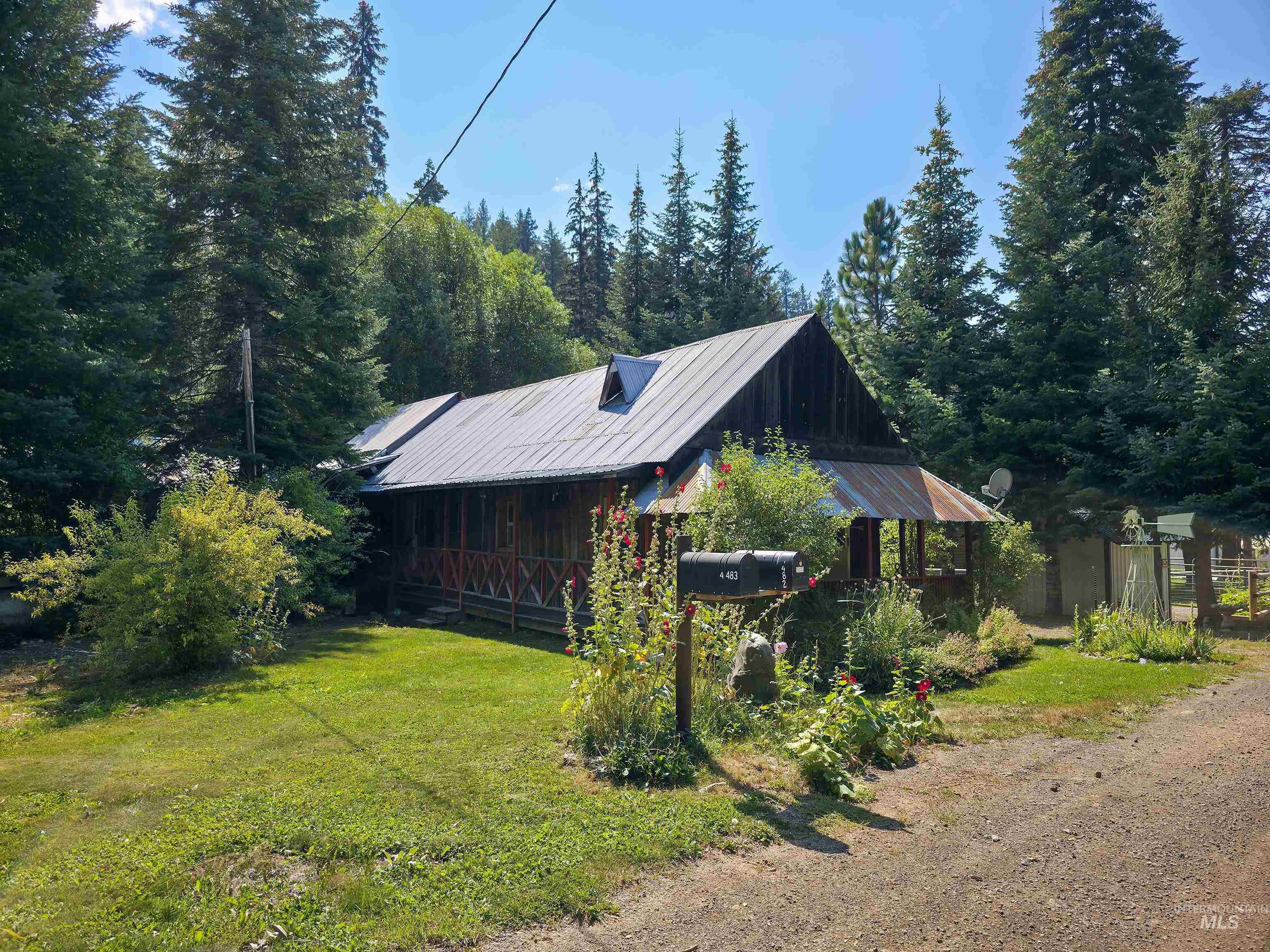4482 Council Cuprum Road Council, ID 83612 - Photo 43 of 45 View of front facade featuring a metal roof and a front lawn