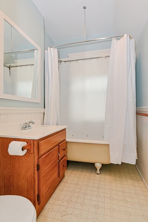 17-19 Walnut Road Somerville, MA 02145 - Photo 14 of 42 a bathroom with a sink and a mirror