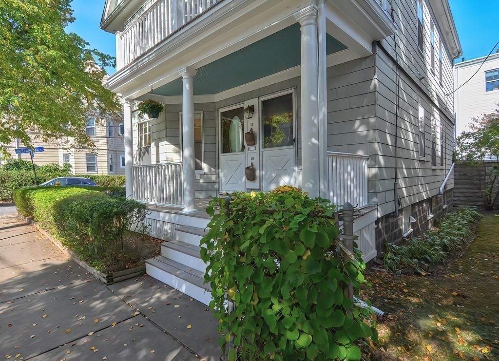 17-19 Walnut Road Somerville, MA 02145 - Photo 19 of 42 a front view of a house with garden