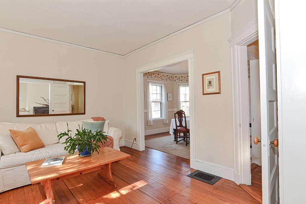 17-19 Walnut Road Somerville, MA 02145 - Photo 25 of 42 a living room with furniture and wooden floor