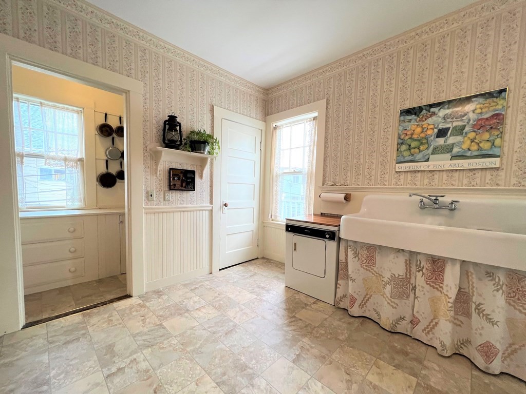 17-19 Walnut Road Somerville, MA 02145 - Photo 30 of 42 a spacious bathroom with a sink mirror and shower