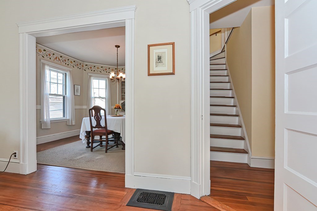 17-19 Walnut Road Somerville, MA 02145 - Photo 31 of 42 a living room with furniture and a wooden floor
