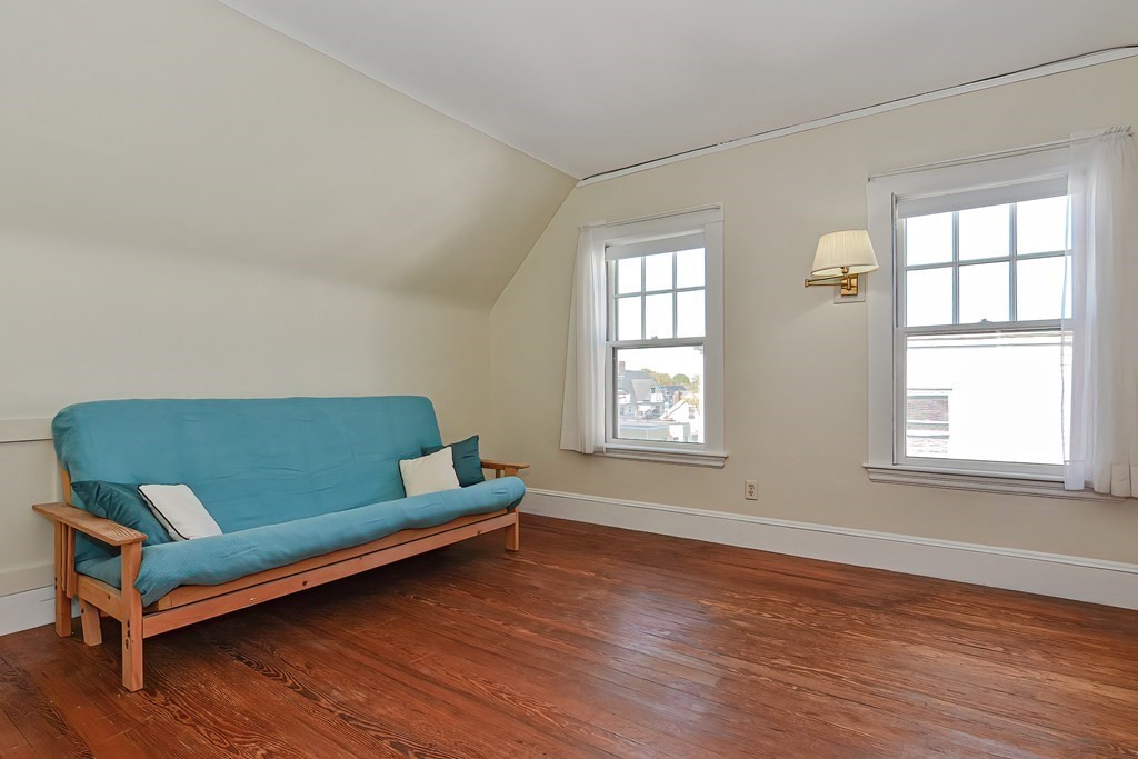 17-19 Walnut Road Somerville, MA 02145 - Photo 33 of 42 a living room with furniture and a window