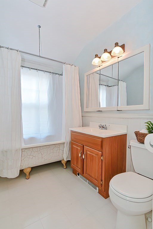 17-19 Walnut Road Somerville, MA 02145 - Photo 35 of 42 a bathroom with a sink a toilet and a bathtub