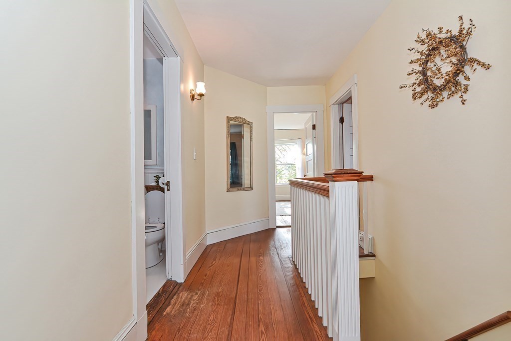 17-19 Walnut Road Somerville, MA 02145 - Photo 36 of 42 a view of a room with wooden floor