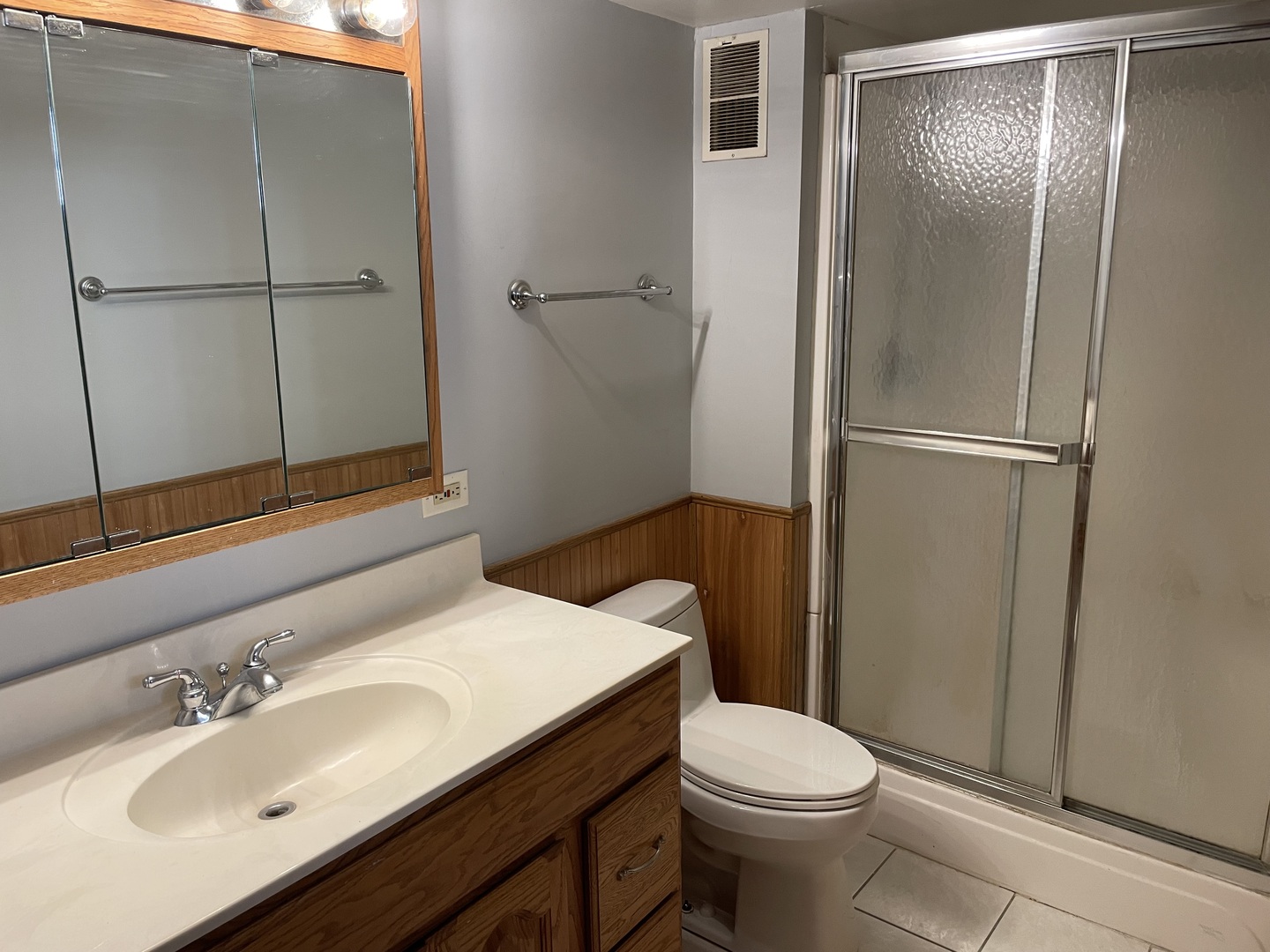 10335 Laporte Avenue Oak Lawn, IL 60453 - Photo 12 of 17 a bathroom with a sink toilet and vanity