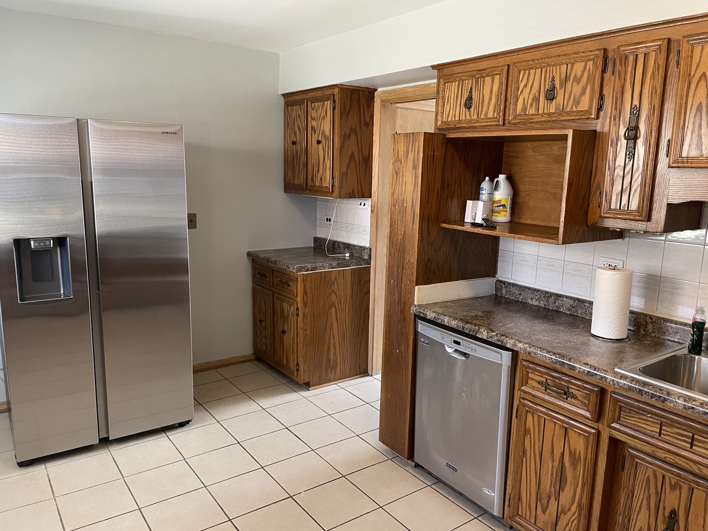 10335 Laporte Avenue Oak Lawn, IL 60453 - Photo 4 of 17 a kitchen with stainless steel appliances granite countertop a refrigerator and a stove