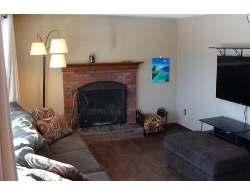32 Juniper Lane Rutland, MA 01543 - Photo 3 of 21 a living room with furniture and a fireplace