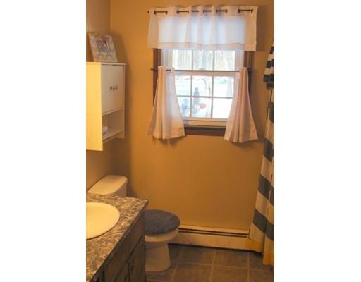32 Juniper Lane Rutland, MA 01543 - Photo 8 of 21 a bathroom with a granite countertop toilet and a sink