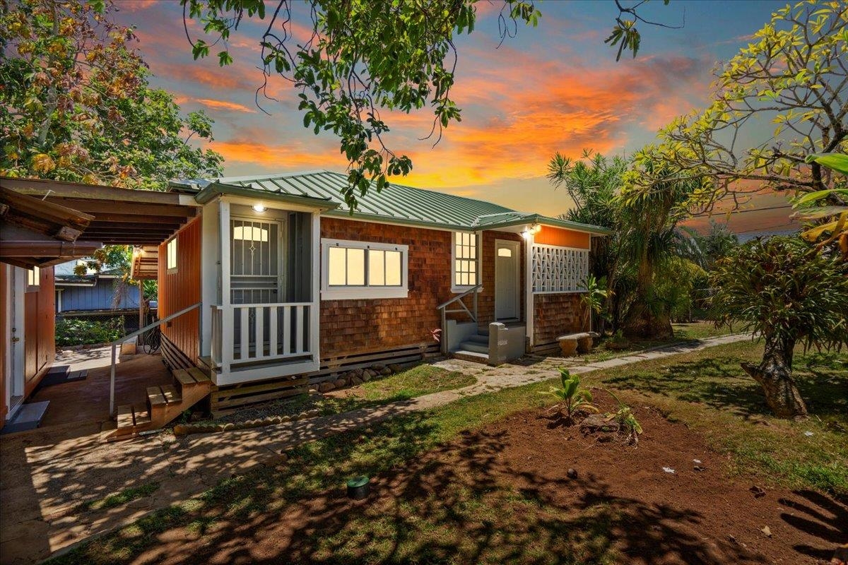 a front view of a house having yard