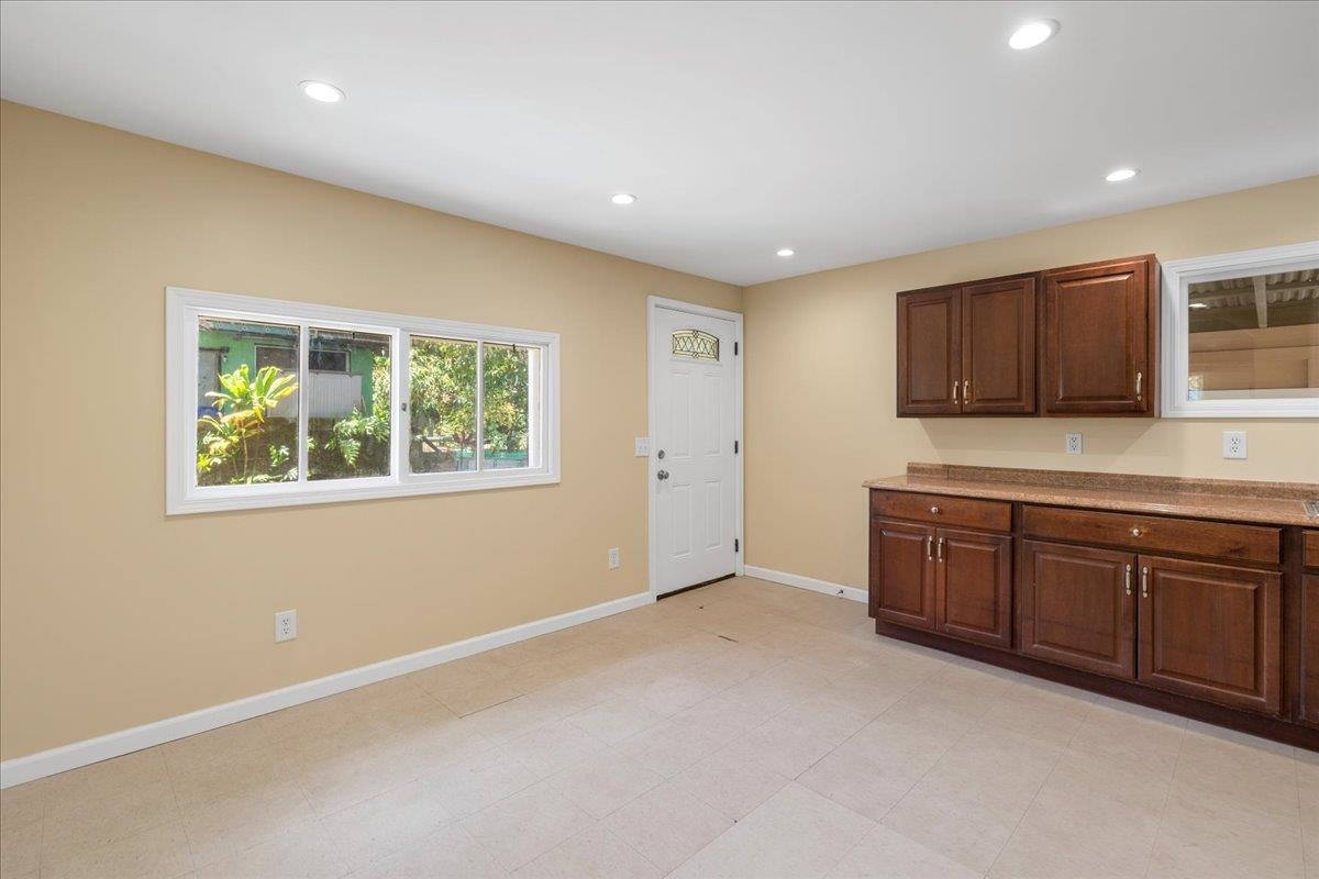 752 Noholani Street Haiku, HI 96708 - Photo 21 of 45 a room with a sink and a window