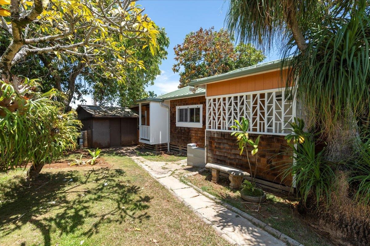 752 Noholani Street Haiku, HI 96708 - Photo 25 of 45 a backyard of a house with seating space