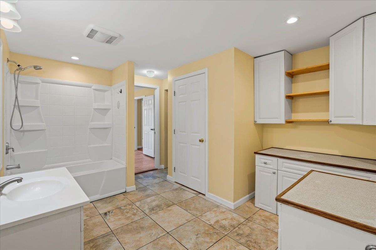 752 Noholani Street Haiku, HI 96708 - Photo 30 of 45 a bathroom with a sink and a shower