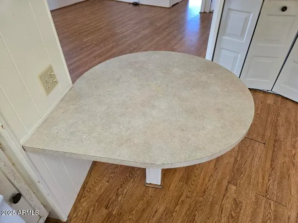 a view of staircase with wooden floor