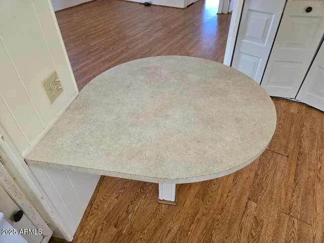 a view of staircase with wooden floor