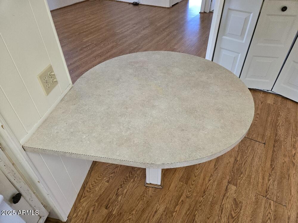 19065 North Dinero Road Sun City, AZ 85373 - Photo 17 of 37 a view of staircase with wooden floor