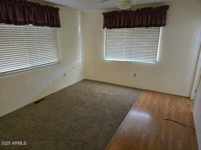a view of a room that has a window in it
