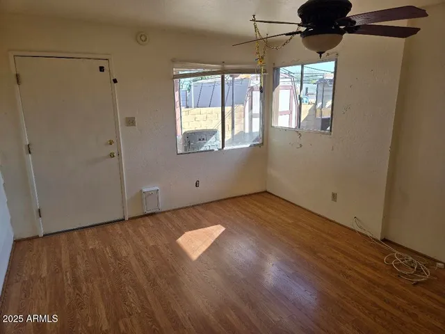 an empty room with windows