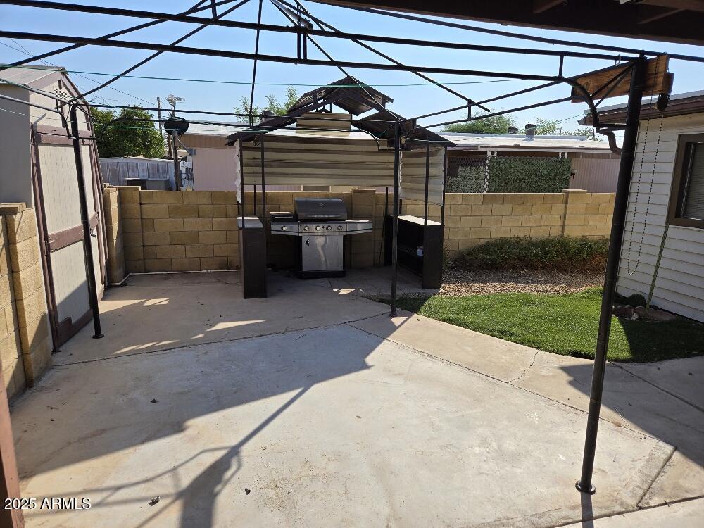 19065 North Dinero Road Sun City, AZ 85373 - Photo 36 of 37 a view of a garage