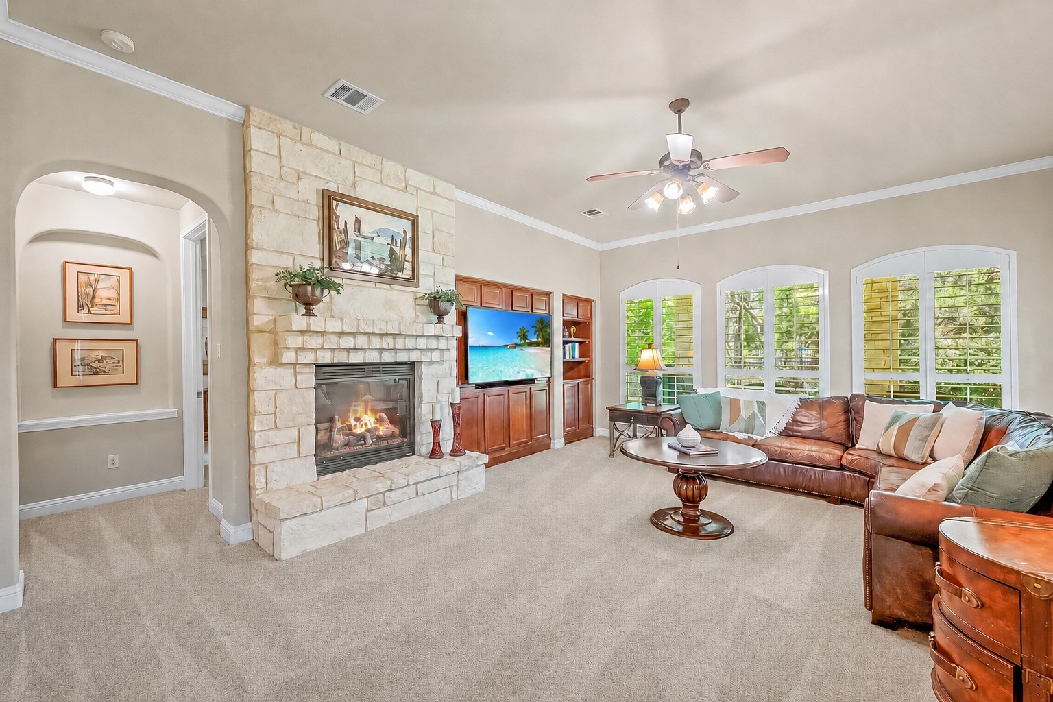14608 Spillman Ranch Loop Austin, TX 78738 - Photo 6 of 31 a living room with furniture and a fireplace